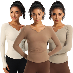 Camiseta de yoga de manga larga para mujer, transpirable, elástica, para gimnasio, que absorbe la humedad, ropa deportiva. - Product Image 1