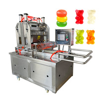 Petite machine à bonbons à rouleaux pour la fabrication de bonbons au chocolat, de bonbons à la menthe, de bonbons au lait, de bonbons mous à la gélatine, de sucettes, de caramel, de bonbons gélifiés, de bonbons durs