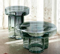 Table basse en verre de style nordique minimaliste moderne avec table d'appoint en forme de pétale, motif rond pour salon