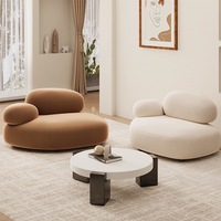 Canapé de salon de style minimaliste moderne canapé en forme de galet ensemble de table basse hall d'hôtel meubles de réception de salon de beauté