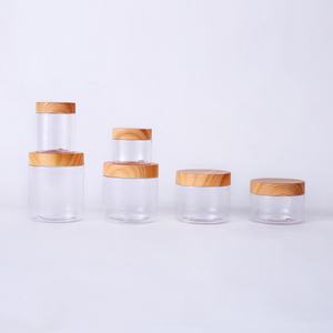 Tarros de plástico con tapa de madera de bambú de 50ml-250ml, tapa redonda con textura de madera, tapa transparente apta para alimentos para mascotas, tapa de bambú de lado liso, tarros cosméticos - Product Image 1