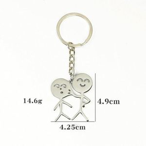 Divertido y parodista colgante para bolso de personaje de dibujos animados, llavero de acero inoxidable al por mayor con diseño de pareja de caras que se pellizcan y mecha de cerillas - Product Image 4