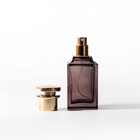Vente chaude Bouteilles de parfum en verre coloré avec bouchons en métal Fabricant Fourniture directe Récipients de parfum personnalisables de haute qualité
