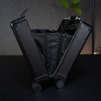 Bagage à main durable en fibre de carbone avec cadre en aluminium, roulettes pivotantes, design unisexe et fermeture et serrure noires