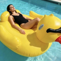 Bouée gonflable en PVC pour adulte en forme de canard avec lunettes, lit flottant, aspect canard jaune, idéale pour s'asseoir et s'allonger, style unique