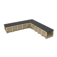 Caniveau de drainage en béton polymère avec sortie pour drainage de surface