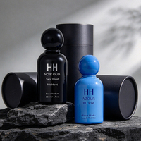 Flacons de parfum ronds incurvés de luxe personnalisés en stock 30ml 50ml 100ml Bouteille en verre noir résistant à la pression avec bouchons à bille