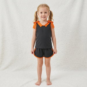 Ensemble de vêtements courts sans manches avec nœuds noirs et oranges pour bébés filles - Product Image 1