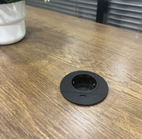 Prise de courant encastrée ronde pour bureau avec port de charge USB-C