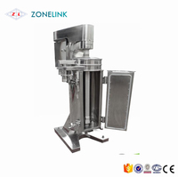 Centrifugeuse tubulaire vierge jus d'huile de noix de coco solution orale séparateur de clarification centrifugeuse verticale tubulaire industrielle Vco
