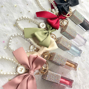 Nuevo estilo, <span class=keywords><strong>tinte</strong></span> hidratante regordete, aceite de labios mágico con llavero de lujo, aceite de labios brillante de fruta vegana, brillo de labios líquido de etiqueta privada - Product Image 1