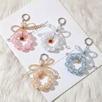 Lanière de luxe haut de gamme faite à la main avec pendentif papillon coloré en cristal et perles, pour étui de téléphone portable, porte-clés de voiture ou sac