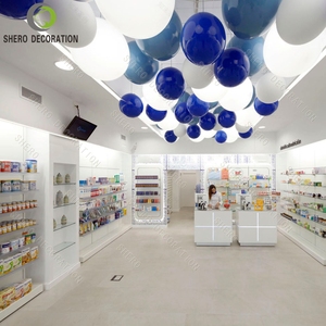 Comptoir de présentation personnalisé pour pharmacie, meuble de pharmacie en bois avec éclairage LED pour aménagement de magasin médical - Product Image 1
