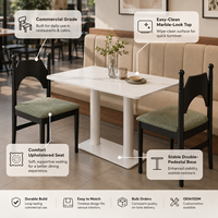 Ensemble de salle à manger commercial, chaises vertes sauge et table aspect marbre avec base à double piédestal pour café et restaurant