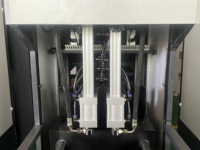 Équipement de soufflage de bouteilles en PET semi-automatique pour bouteilles d'une capacité de 100 ml à 2 L
