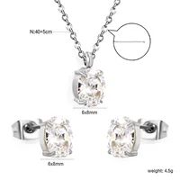 Ensemble de collier et boucles d'oreilles en acier inoxydable avec nœud papillon et zircon pour femmes, ensemble de bijoux tendance en forme de cœur transparent