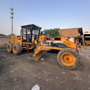 รถเกรดเดอร์ CAT 140K มือสอง น้ำหนัก 14200 กก. 800 ชั่วโมง รุ่นปี 2025 เครื่องยนต์ Caterpillar ผ่านการทดสอบและตรวจสอบแล้ว เหมาะสำหรับงานก่อสร้าง - Product Image 1