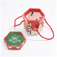 Maßgefertigte Wiederverwendbare Tragbare Weihnachts-Süßigkeiten-Geschenkbox mit Seilgriff Sechseckig Rot-Grün Weihnachtsmann-Aufdruck für Weihnachtsfeier-Gastgeschenke