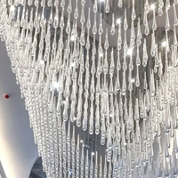 Lustre moderne suspendu en cristal en forme de goutte d'eau avec éclairage LED pour hall d'hôtel, villa, duplex, salon et escalier
