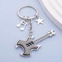 Rock gitar musik catatan liontin gantungan kunci untuk pria wanita bintang instrumen musik gantungan kunci mode Punk aksesoris hadiah perhiasan