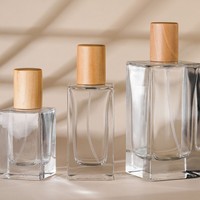 Flacon de parfum en verre épais de haute qualité 30ml 50ml 100ml, flacon vaporisateur de parfum transparent rectangulaire avec bouchon noir