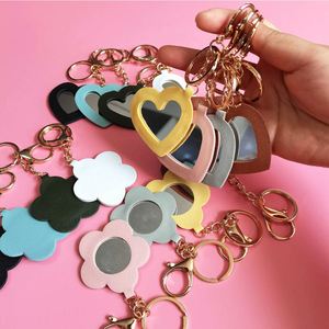 2024 New Wholesale Mini Makeup PU Mirror With <b>Key</b> <b>Chain</b> Private Label Cute Flower Heart Shape Mirrors - Product Image 4