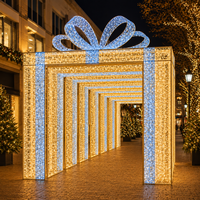 Arche lumineuse tunnel motif boîte cadeau de Noël extérieure grand format, homologuée IP65, très populaire pour la décoration des fêtes