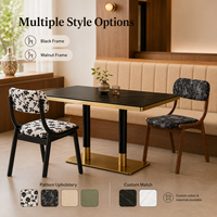 Ensemble table et chaises de restaurant en pierre noire avec chaises en tissu imprimé floral, en vente pour café, traiteur et maison d'hôtes