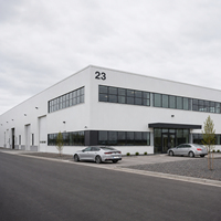 Bâtiment de bureaux moderne à grande hauteur en structure acier, immeuble commercial multi-étages à ossature métallique, construction professionnelle sur mesure