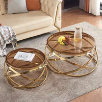 Table basse moderne multifonctionnelle en acier inoxydable avec plateau en verre trempé et marbre, design simple et créatif