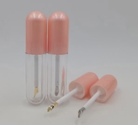 Nouveau Tube de brillant à lèvres en forme de capsule de 5ml Applicateur métallique de luxe Brosse à pieds Biche Glaçure à lèvres ronde Bouteille Liptint Base transparente