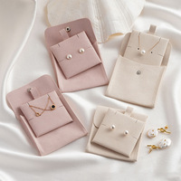 Sac de rangement portable carré anti-poussière avec bouton-pression pour bijoux (colliers et boucles d'oreilles) – Style tendance – En stock