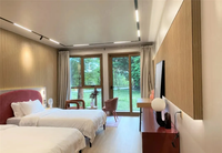 Maison préfabriquée de luxe pour hôtel, maison mobile VIP Galaxy Bamboo, maison conteneur personnalisable avec murs et fenêtres en verre