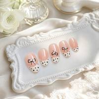 Y177 Kaixin OEM – Kit de faux ongles courts en amande réutilisables, style français à pois et nœuds, en ABS, 10 pièces, finition vernie brillante
