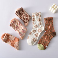 Usine en gros unisexe mi Tube coton chaussettes automne hiver nouveau relief motif tridimensionnel tricoté respirant femmes
