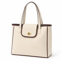 Sac fourre-tout structuré en toile 12 oz avec fermoir torsadé doré et bordure contrastante, sac à main pour femme avec base autoportante, vente en gros