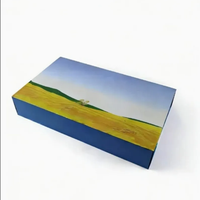 Boîte cadeau en papier écologique en forme de livre bleu, couverture rigide, avec logo personnalisé en relief, laminage mat, avec poignée