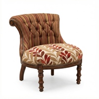Fauteuil capitonné antique avec dossier rayé, assise à motif de feuilles botaniques, garniture à clous en laiton et pieds tournés sculptés