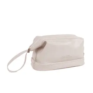 Bolsa de cosméticos de doble capa de cuero PU portátil impermeable de lujo con logotipo personalizado al por mayor, bolsa de maquillaje sobre transparente