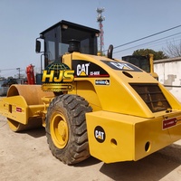 Compacteur vibrant d'occasion Caterpillar CS683E, modèle 2022, 129 kW, à tambour unique, pour la construction routière