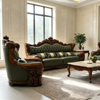 Ensemble de canapés de style manoir européen vintage en cuir capitonné olive, structure en fibre de verre sculptée en noyer foncé avec table basse en marbre