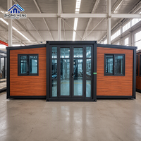 Maison modulaire extensible à double aile de 20, 30 ou 40 pieds avec porte d'entrée centrale en verre pour maison-conteneur de jardin