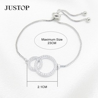 Bracelet de luxe pour femme en laiton plaqué rhodium, fait main, écologique, avec design martelé à double cercle et pavé de zircons sertis en canal