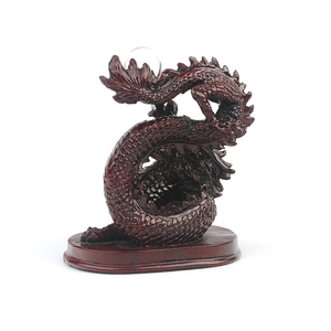 Statua Antica di Drago in Resina Rossa che Gioca con la Palla - Product Image 3