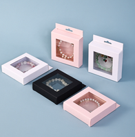 Boîte cadeau en carton rigide écologique avec fenêtre transparente, gaufrage, impression en héliogravure, pelliculage mat, logo personnalisé pour cosmétiques