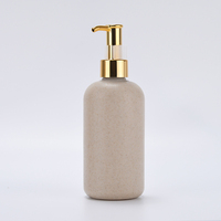 Récipient vide en plastique biodégradable de paille de blé écologique contenant cosmétique de fournitures d'hôtel avec pompe à shampoing de luxe en or