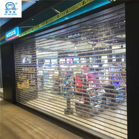 Prix de gros personnalisé smart shop porte d'entrée en alliage d'aluminium pc lattes porte transparente à volet roulant