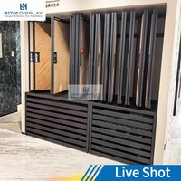 Présentoir de sol personnalisable avec pages rabattables et tiroirs, en métal, pour échantillons de revêtements de sol en showroom