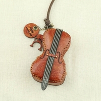 Pochette de luxe en cuir pleine fleur tanné végétal, faite à la main, véritable mini pochette zippée, pendentif rétro pour instrument de musique, avec breloque violon