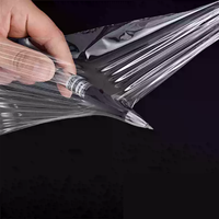 50cm 수동 식품 등급 스트레치 필름 롤 LLDPE 50 미크론 두께 광택 고광택 컴퓨터 사용 50cm/30cm